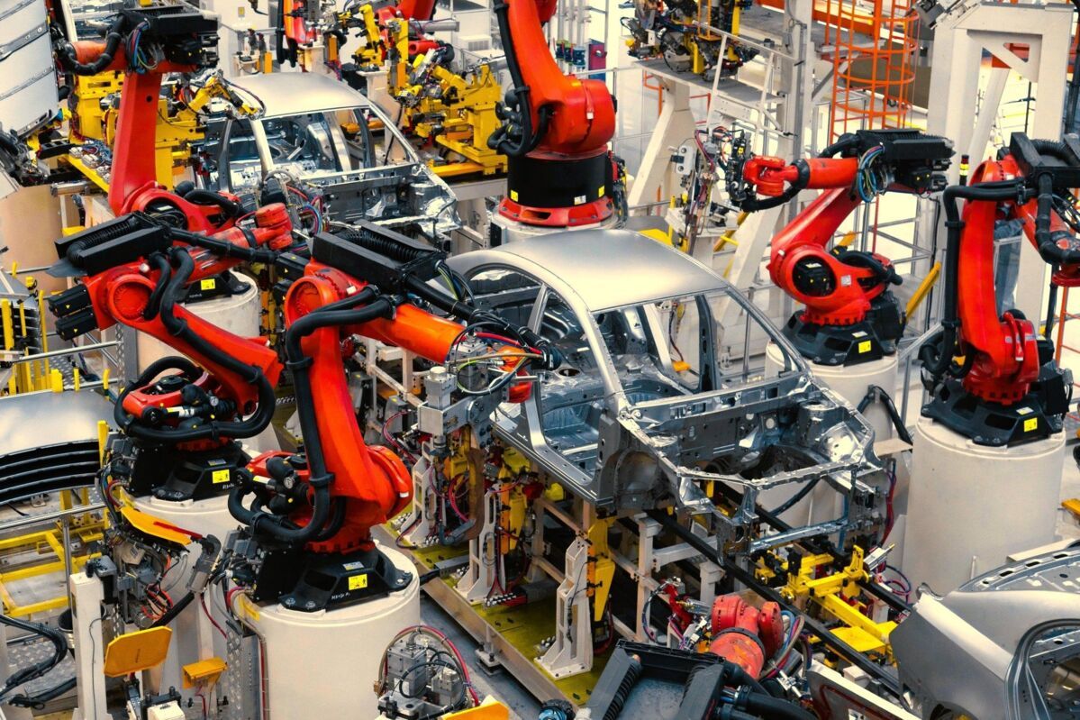 Automotive assembly line. Car body welding. Modern car assembly plant.