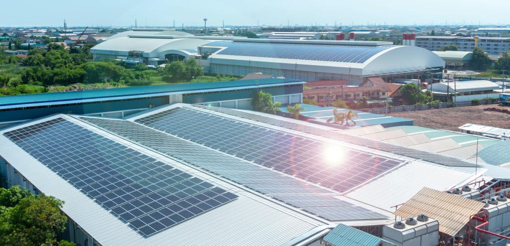 Solar panels on flat roof in an industrial zone